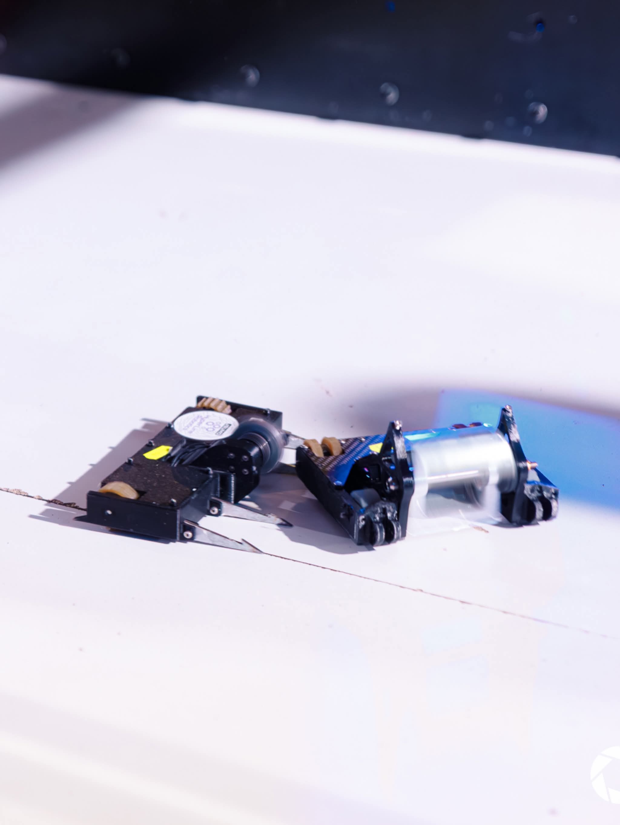 Two combat robots squared up
